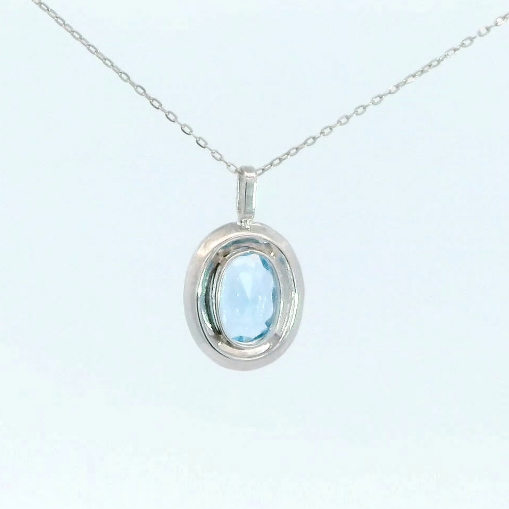 GOLGANTE ORO BLANCO CUAJO 10MM PIEDRA COLOR AGUAMARINA 7x5MM.