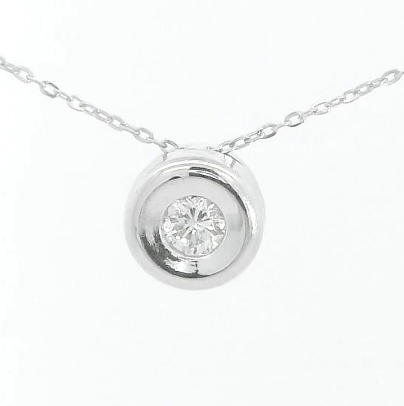 COLGANTE CHATON ORO BLANCO 6MM.BRILLANTE H-SI 1. 0.10CT