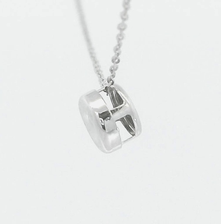 COLGANTE CHATON ORO BLANCO ESTAMPACION 4.5MM.BRILLANTE H-SI 1. 0.03 CT.0.03CT.