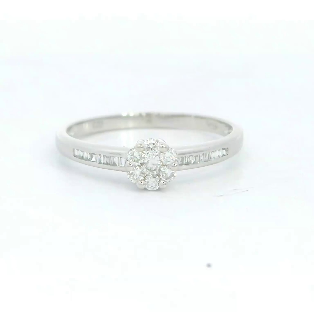 SORTIJA CUAJO BRILLANTES SI1-H .0.26 CT TW.