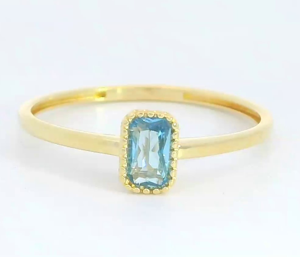 SORTIJA OCTOGONO COLOR AGUAMARINA DE 6x4MM.9 KILATES