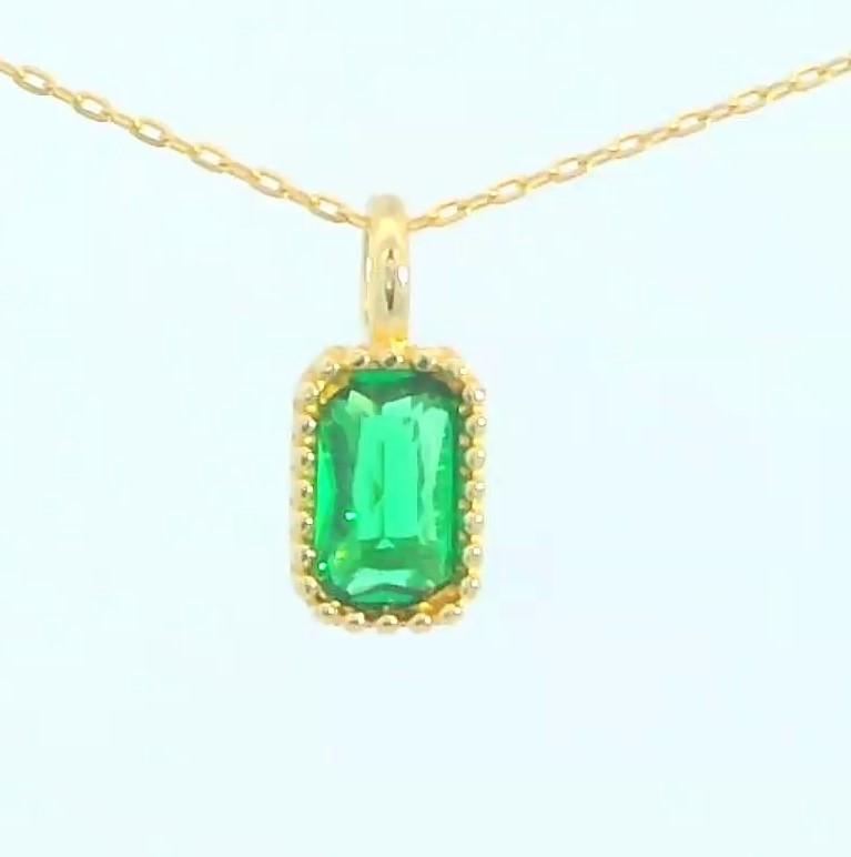 COLGANTE OCTOGONO NANO ESMERALDA DE 6x4MM.9 KILATES