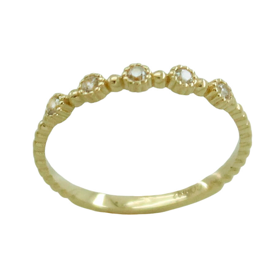 SORTIJA CON CINCO CIRCONITAS.CABEZA 2'5MM.