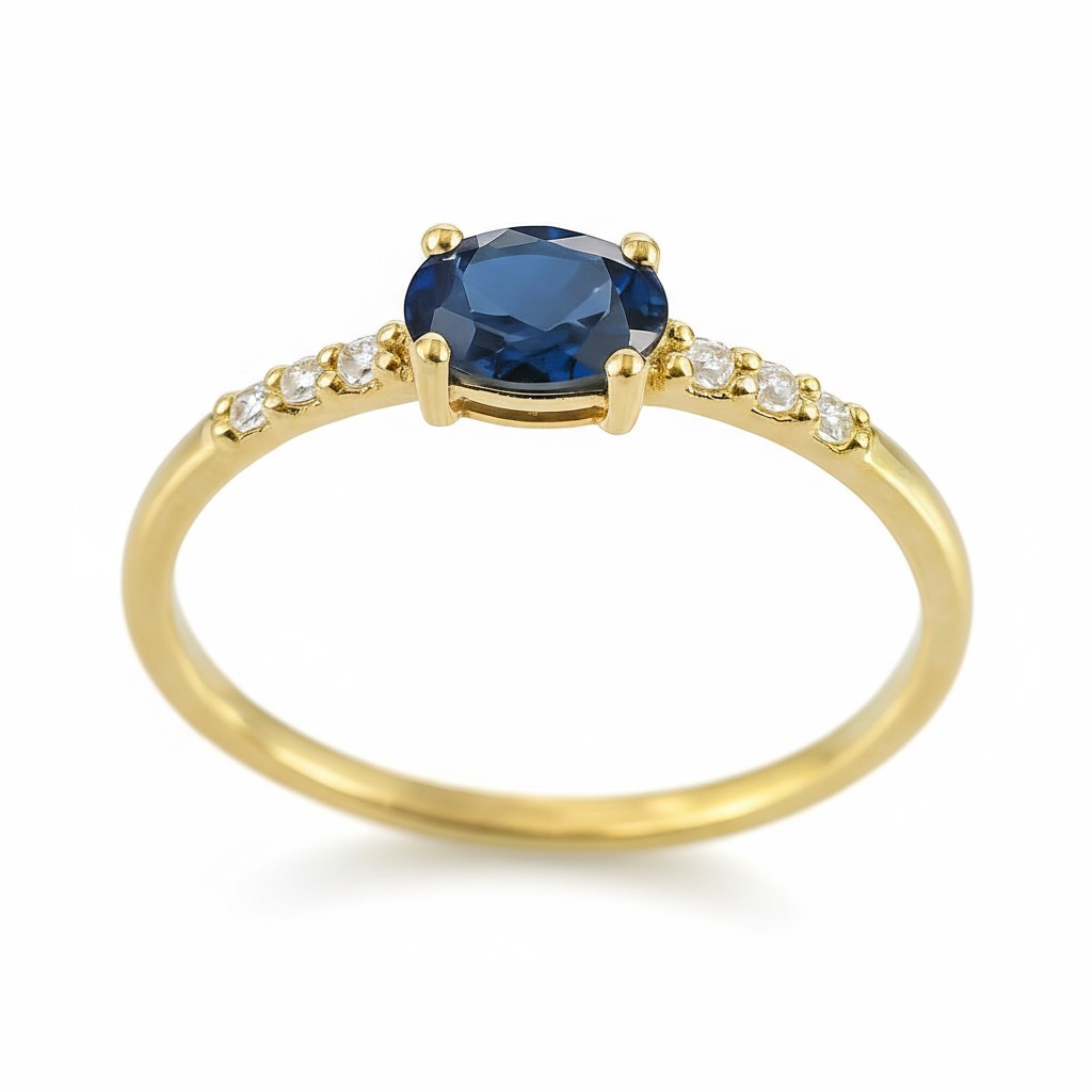5x3MM OVAL SHAPPIRE AND CZ RING.