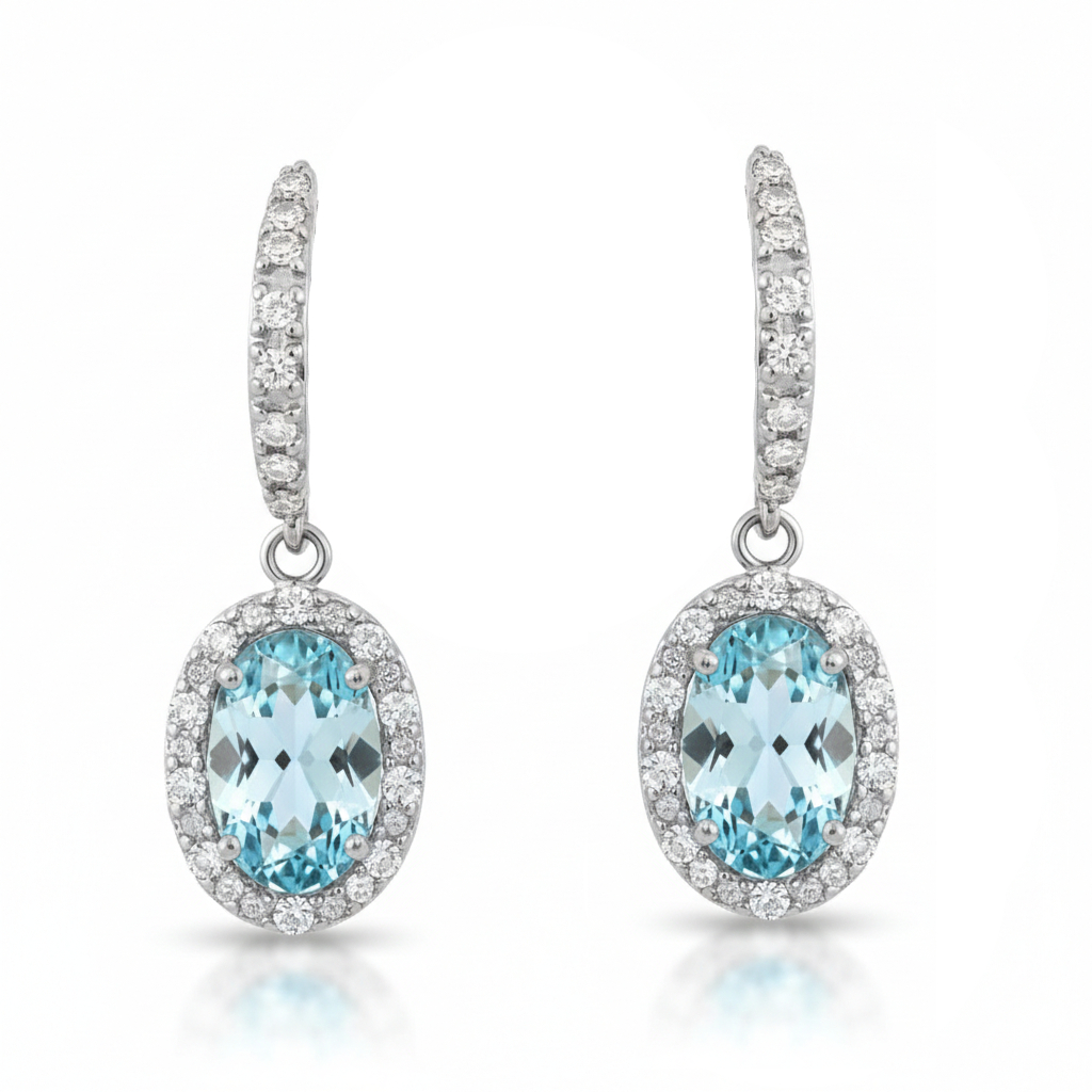 18MM OVAL AQUAMARINE AND CZ DANGLING EARRINGS.WHITA GOLD