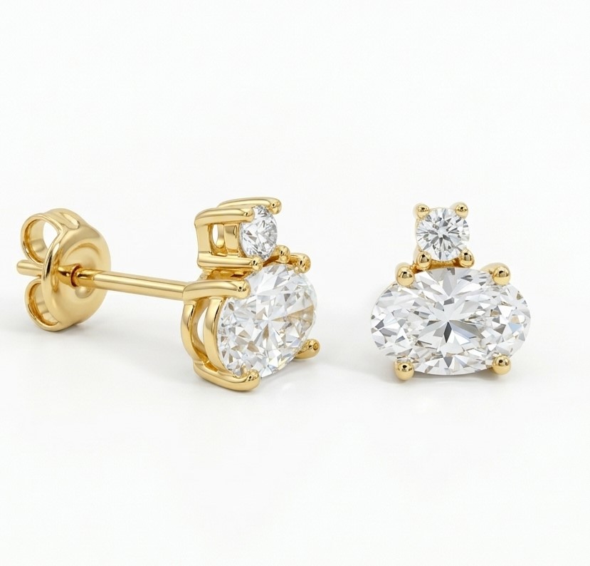 PENDIENTE OVAL 2 GARRAS 6X4MM.9 KILATES