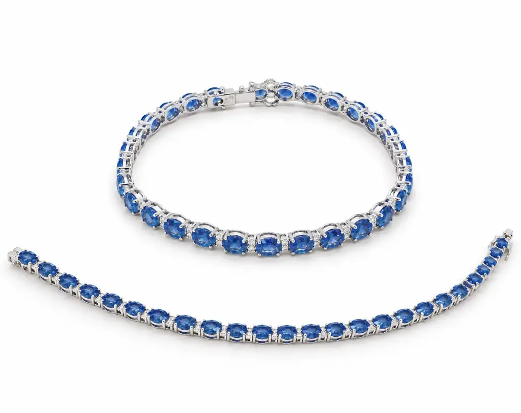 PULSERA RIVIERE DE BRILLANTES Y ZAFIROS.18CM DI 56RD SI H 0.31Y 27 ZAFIROS 10.62 CT TW.ORO BLANCO