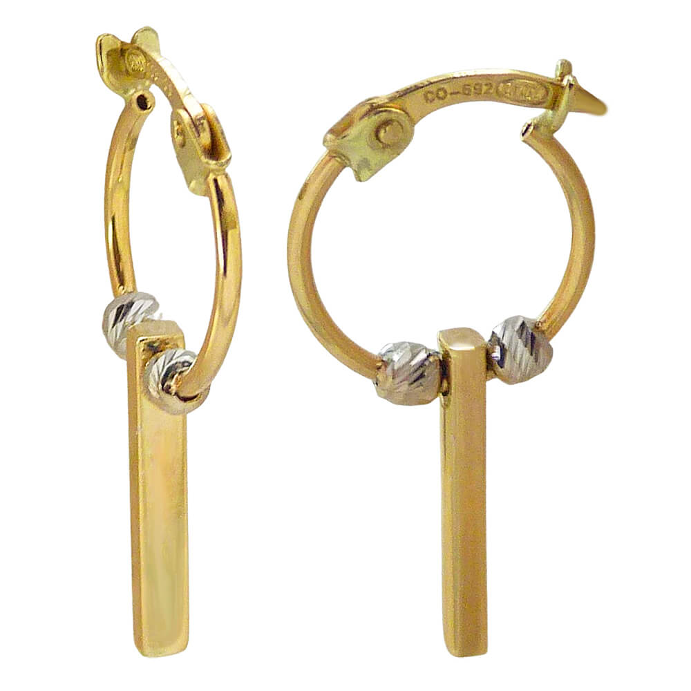 HOOP EARRINGS WITH STICK AND CARVED BALLS.